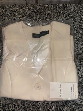 Woman’s Vest. Size M. Brand New. Never opened
